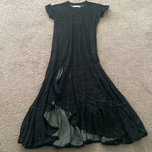 Free People flowy short sleeved dress with ruffle bottom.